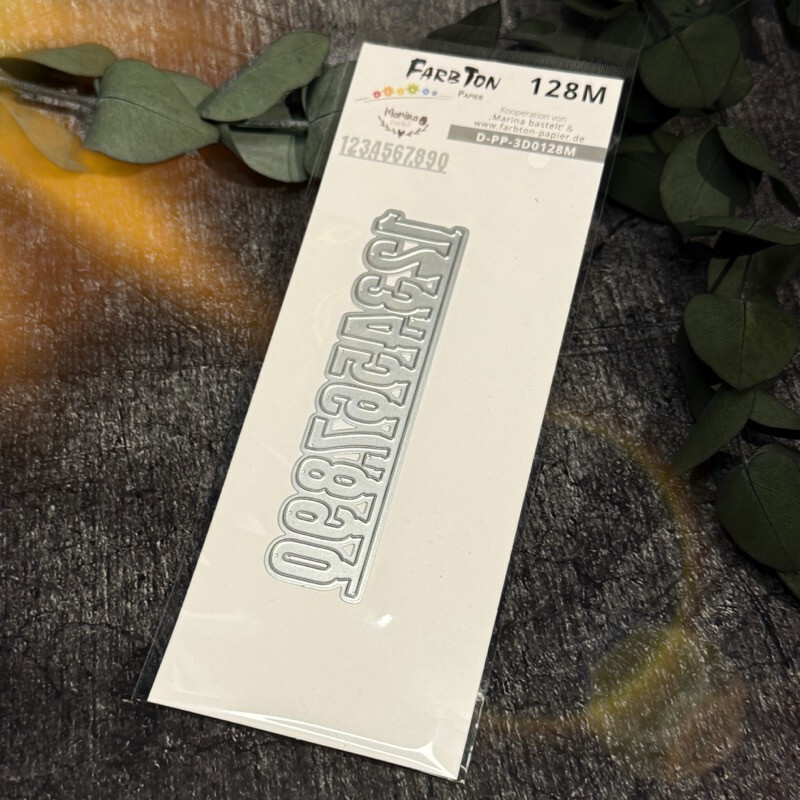 Stanze Mittel-Zahlen auf Papierleiste